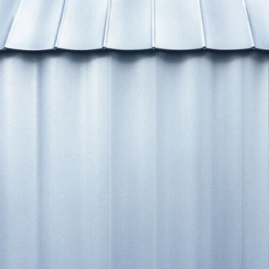 Zinc standing seam roof panels with a soft matte blue-gray natural patina