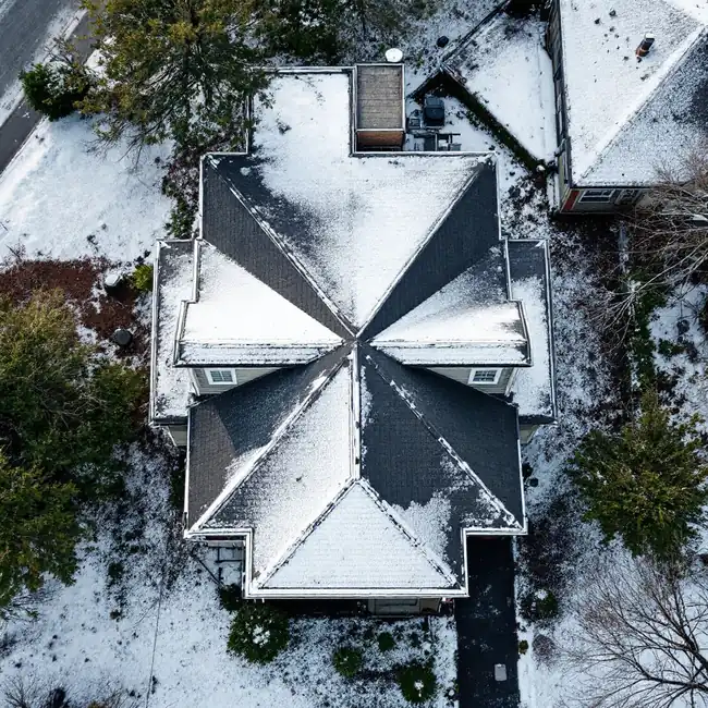 Aerial view of a simple plain gable roof on a rectangular house with two clean slopes and one ridge