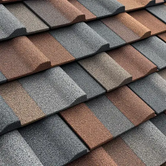 Multi-tone blended architectural asphalt shingles in warm brown and gray tones, several shades within one course
